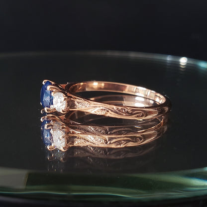 Melitele Ring with Sapphire and Diamonds