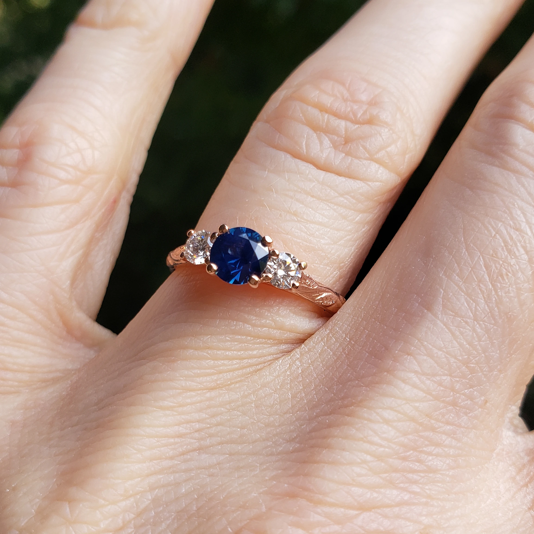 Melitele Ring with Sapphire and Diamonds