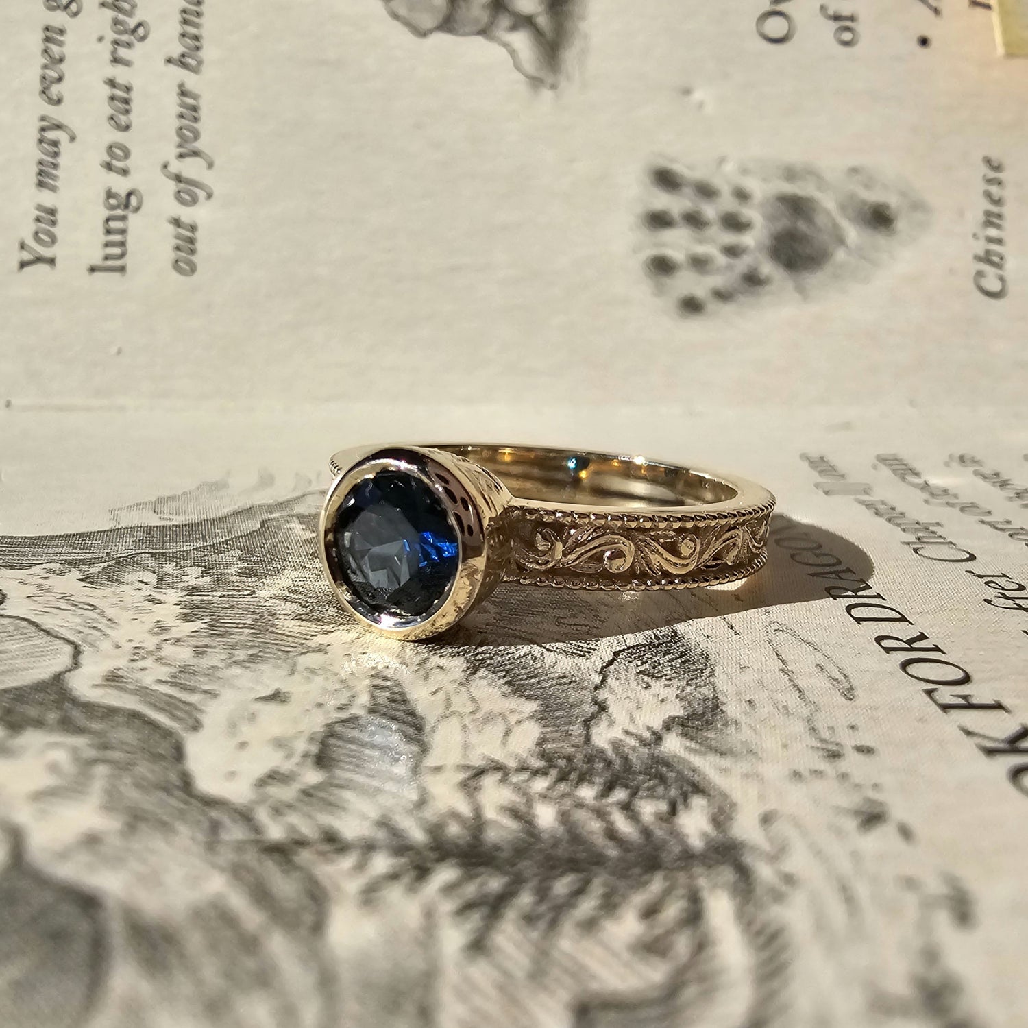 Nivenor Ring with Sapphire