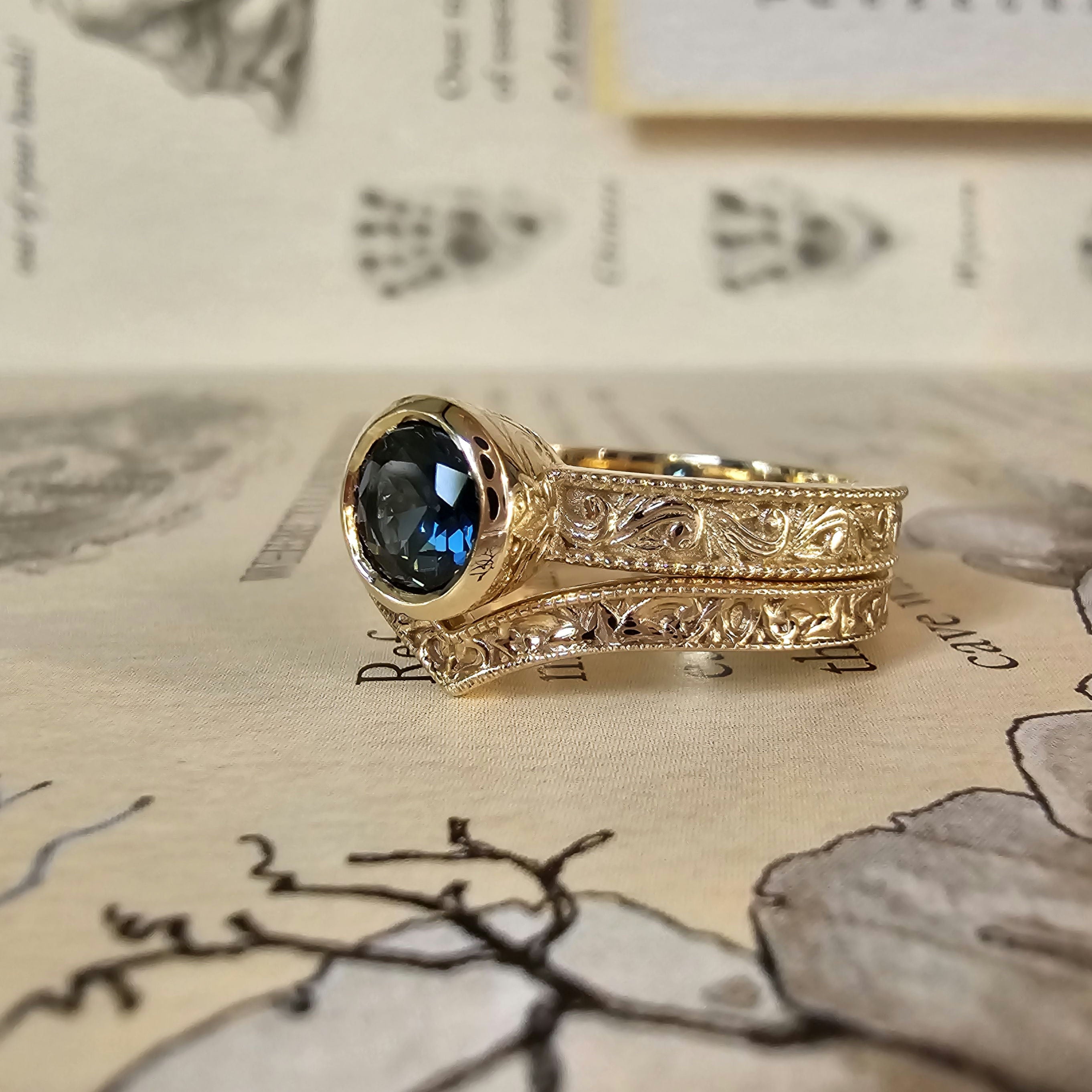 Nivenor Ring with Sapphire