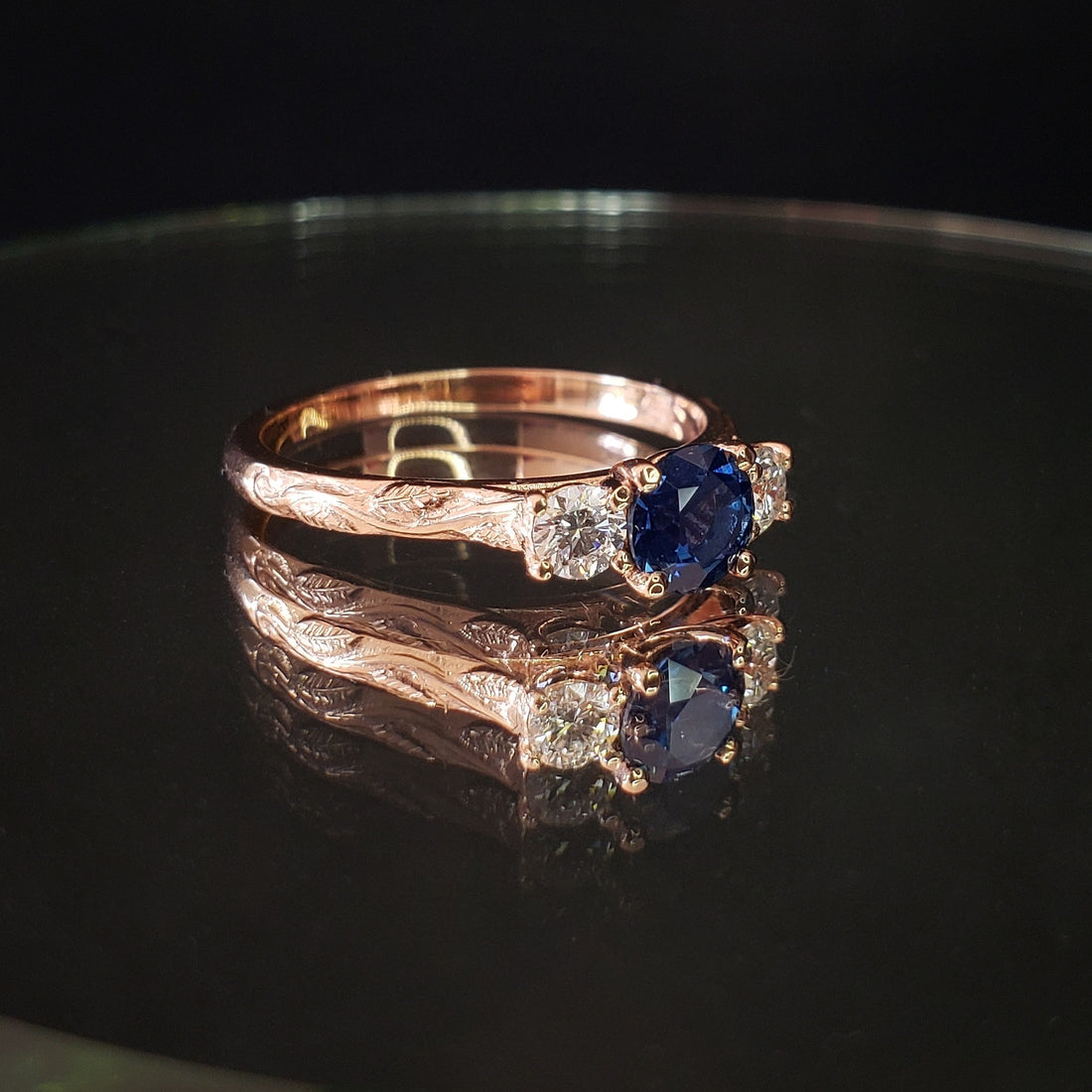 Melitele Ring with Sapphire and Diamonds